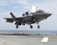 An F-35B Lightning II aircraft lands aboard the amphibious assault ship USS Wasp (LHD 1) during the second at-sea F-35 developmental test event