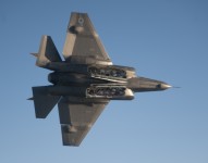 An F-35C Lightning II is flown to evaluate the aircraft's flying qualities with the internal weapons bays open loaded with AIM-120 Advanced Medium-range air-to-air missiles